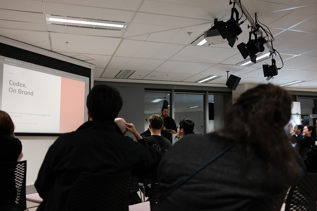 Celilsemi Sam Erkiner presents his Codex On Brand workflow to the room.